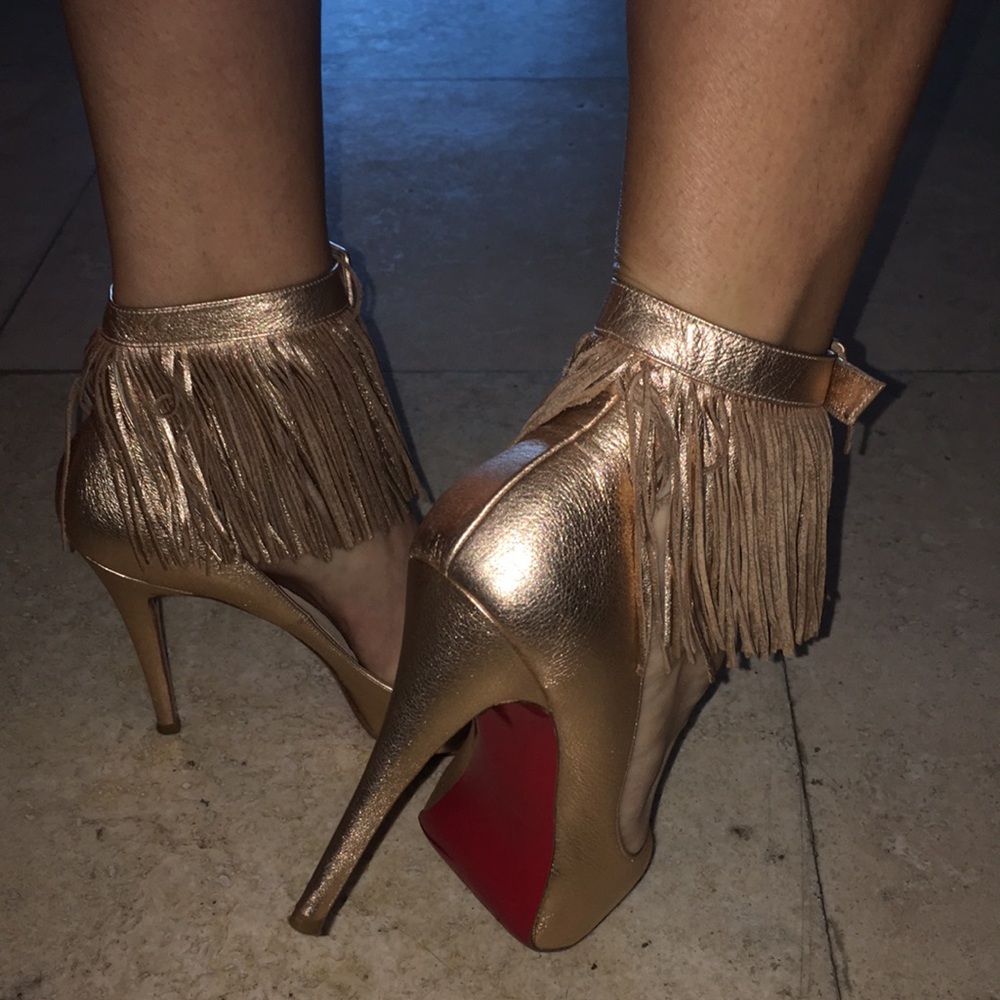 Christian Louboutin gold heels